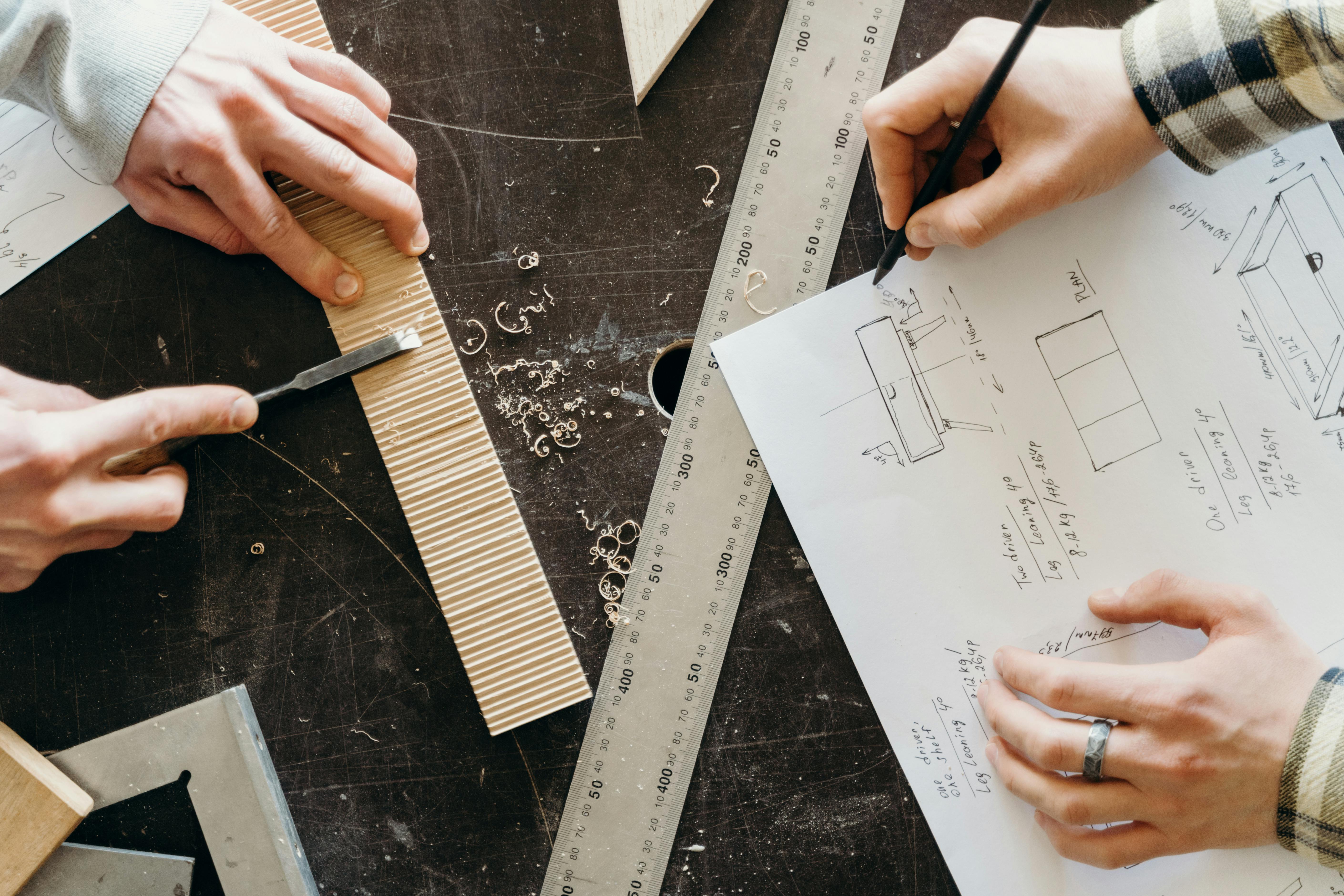 Woodworker reviewing digital plans